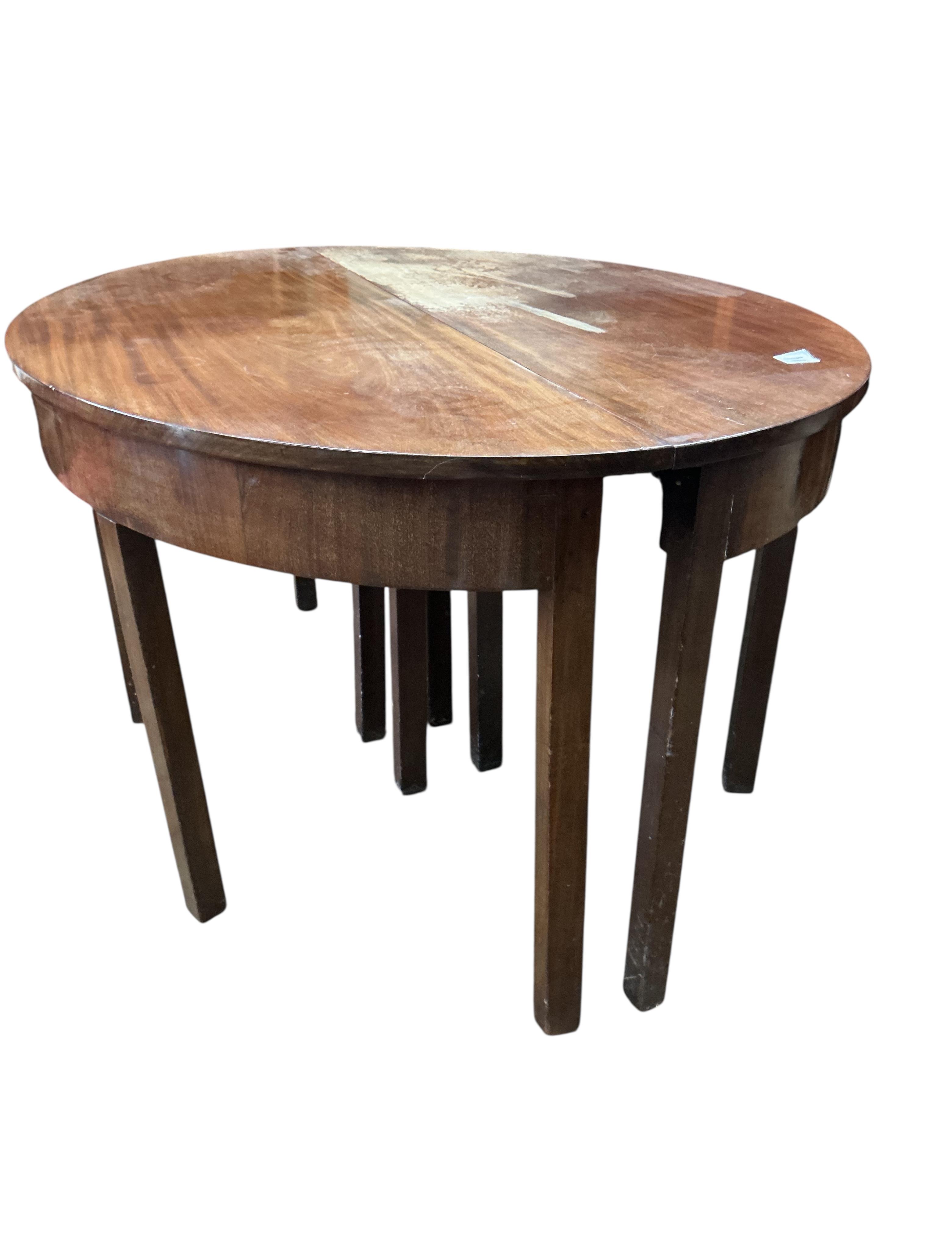A George III mahogany D end extending dining table, 208cm extended, two spare leaves, depth 131cm, height 72cm